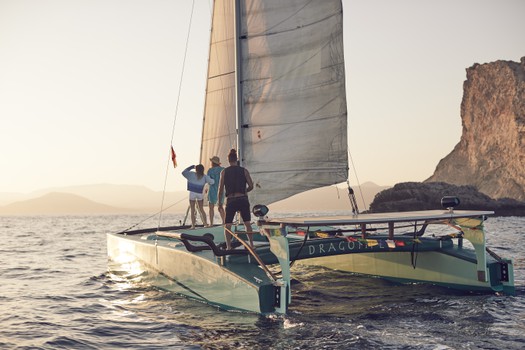 Big charter groups sunset trip on Ecological Catamarans in Formentera, Ibiza
